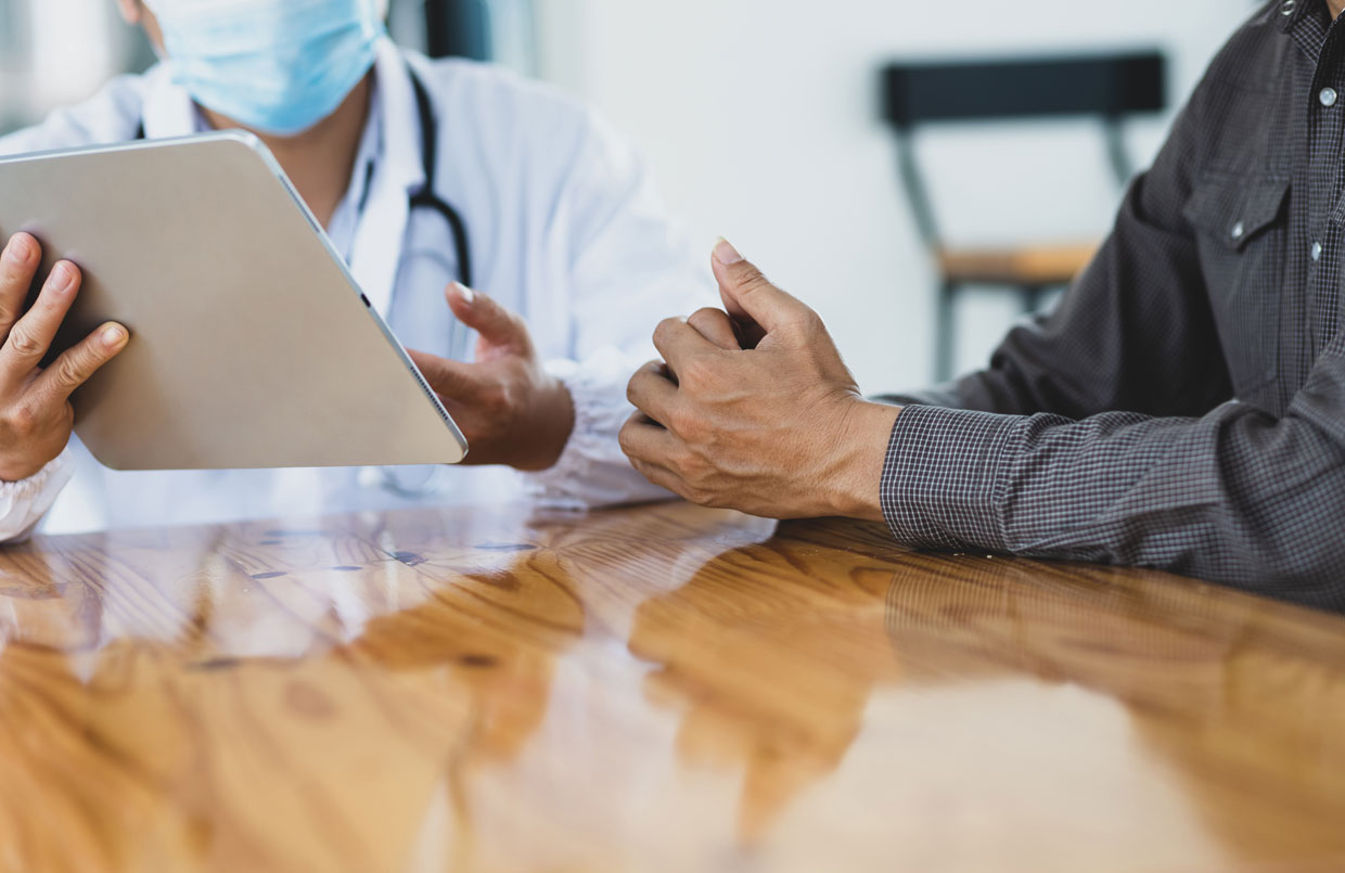 a doctor discussing results with a patient