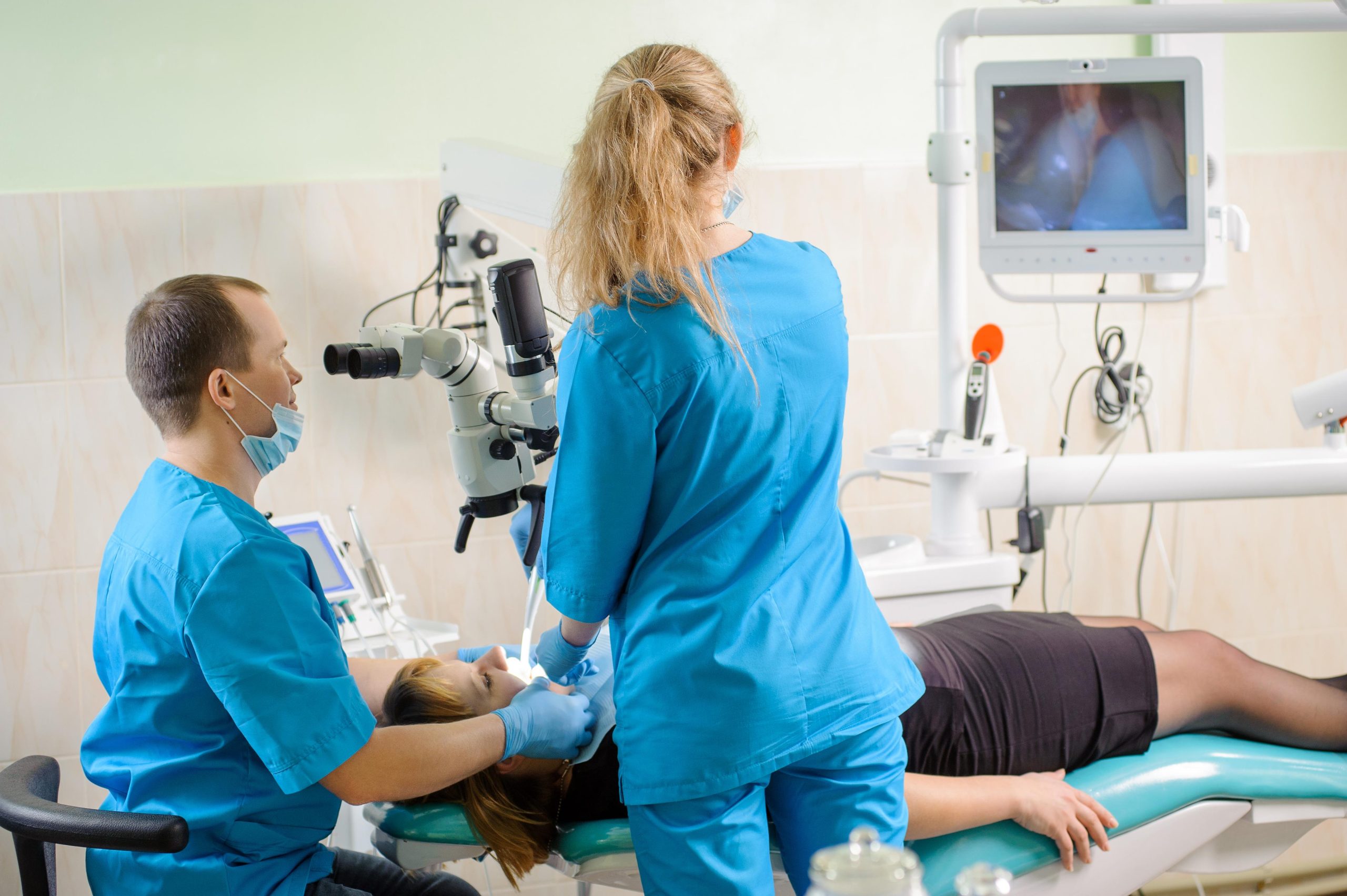 healthcare workers examining a patient