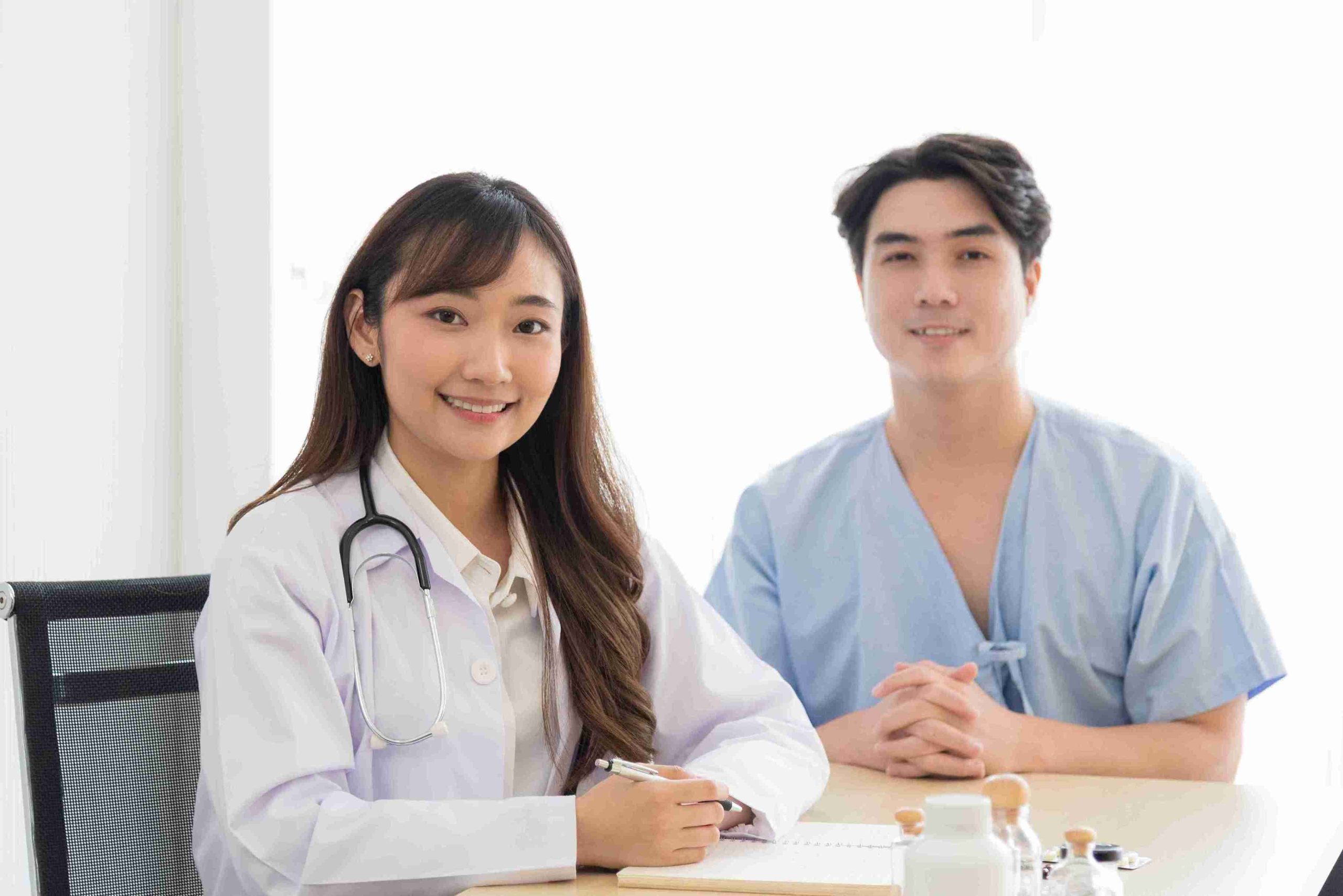 young male patient with young female doctor