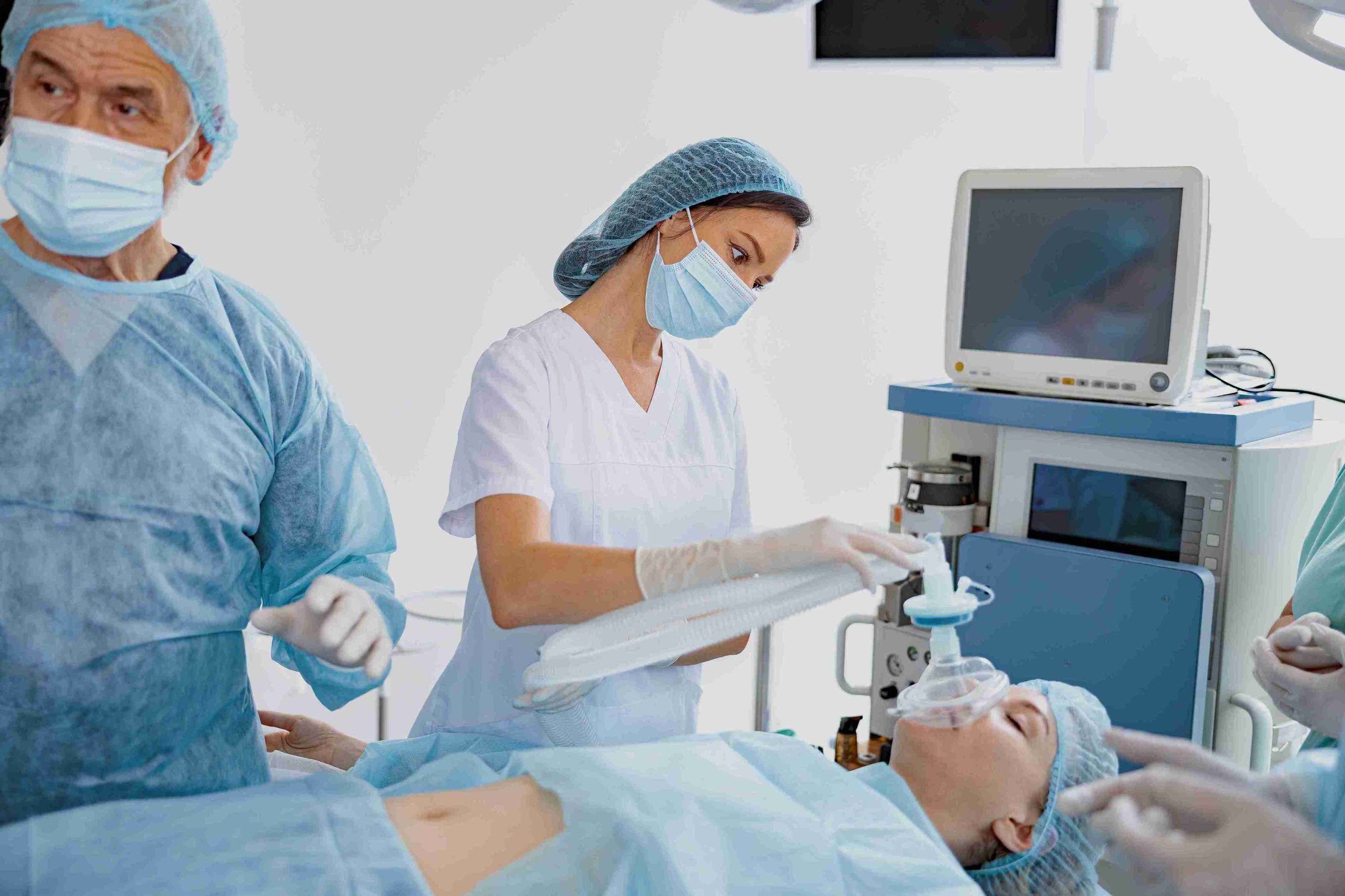 healthcare worker preparing a patient for surgery