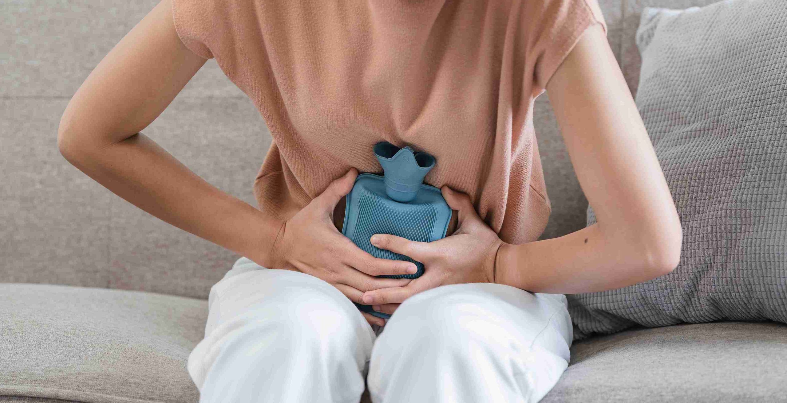 woman experiencing gastric pain