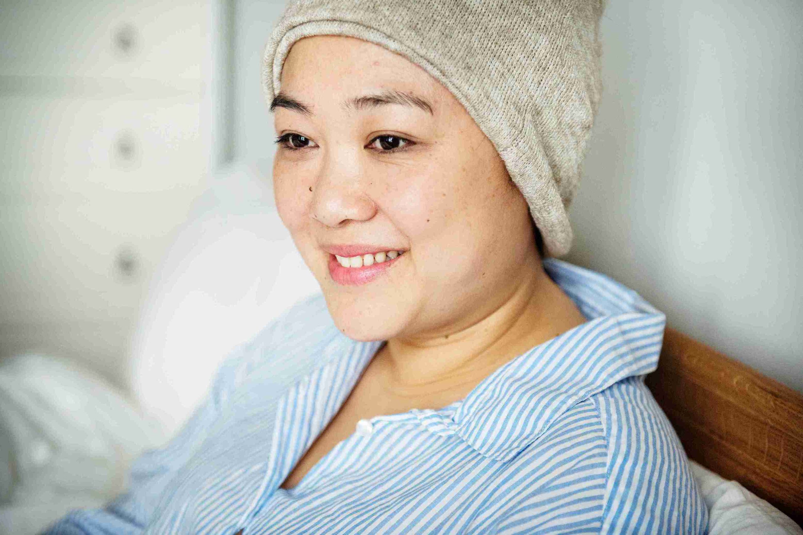cancer patient smiling at the camera