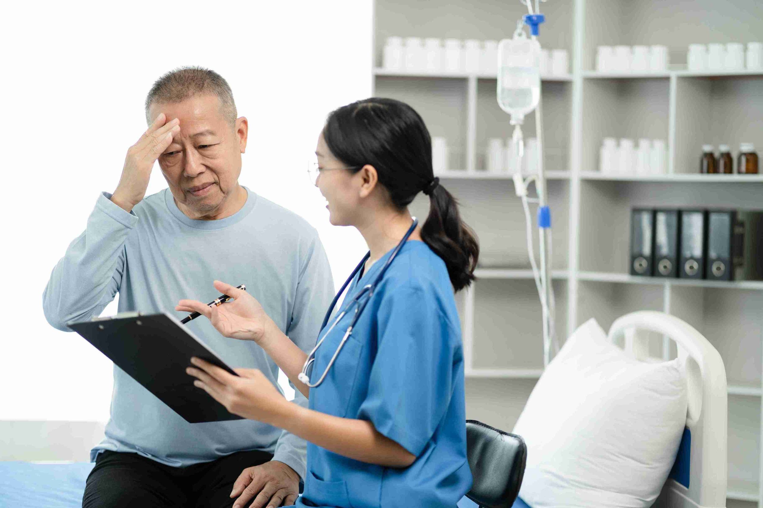 elderly patient confused while talking to healthcare worker