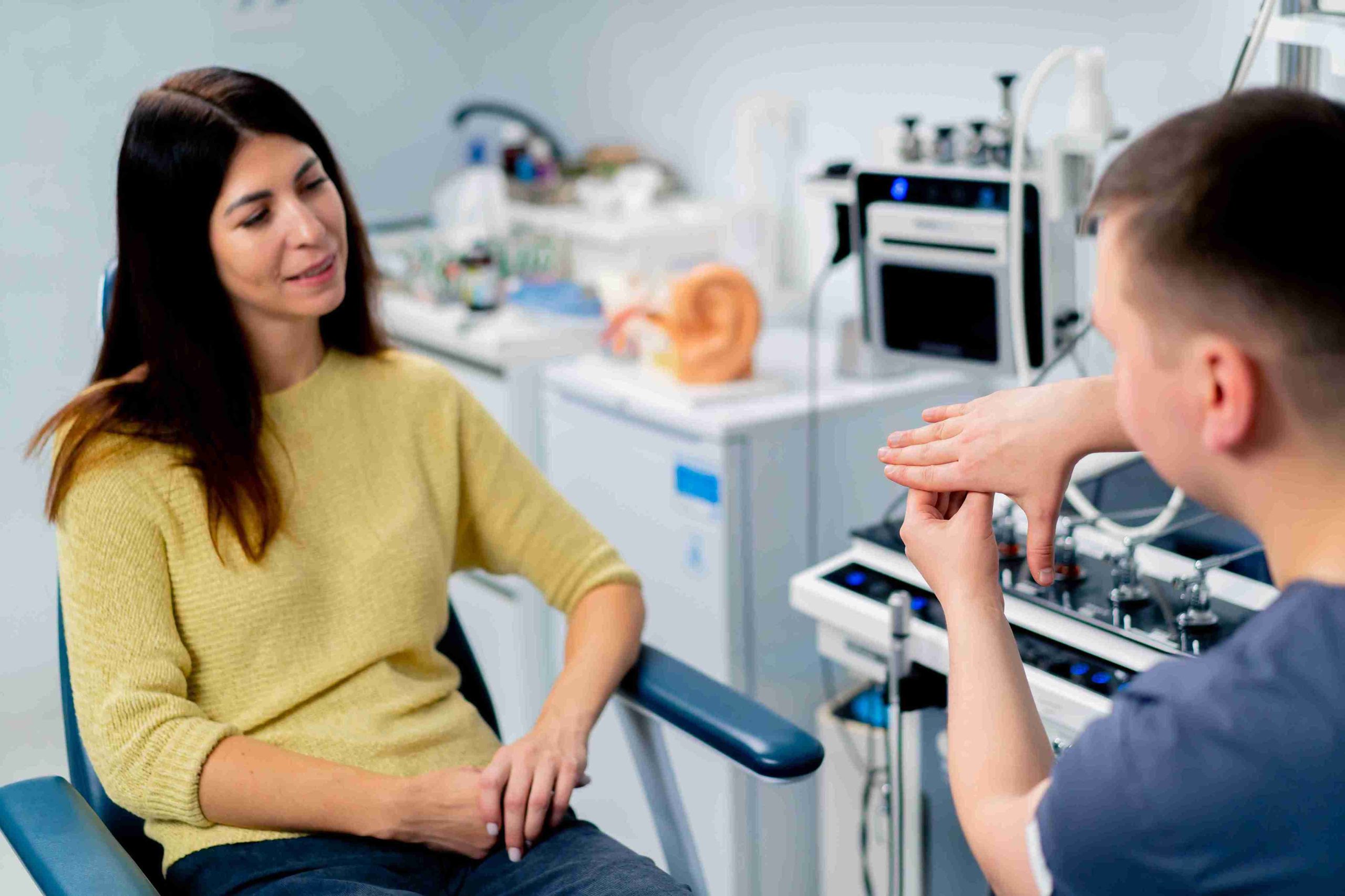 female patient speaking with a doctor