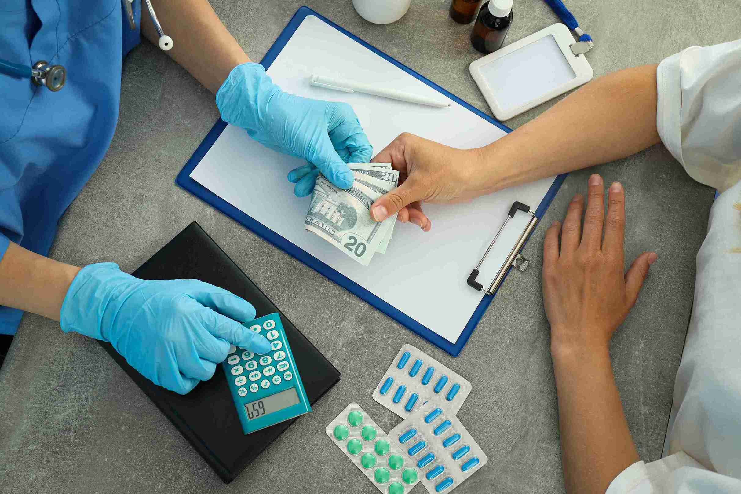 doctor receiving money