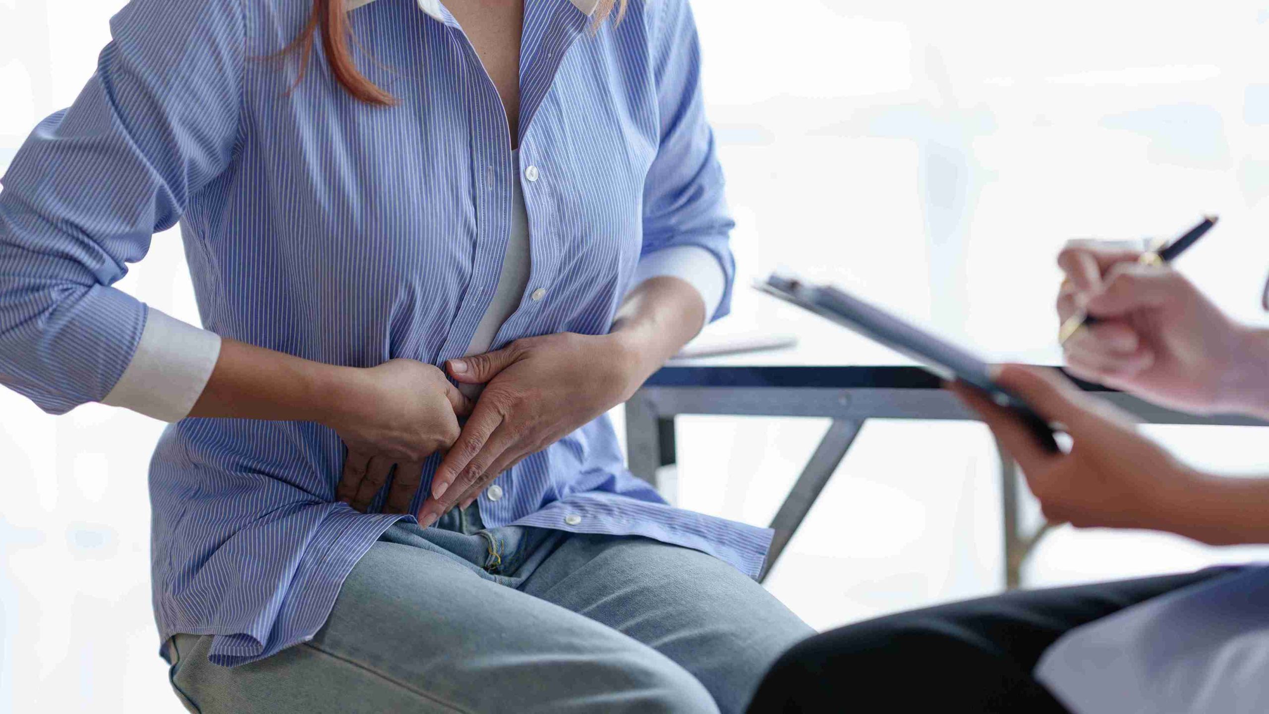 female patient with stomach pain