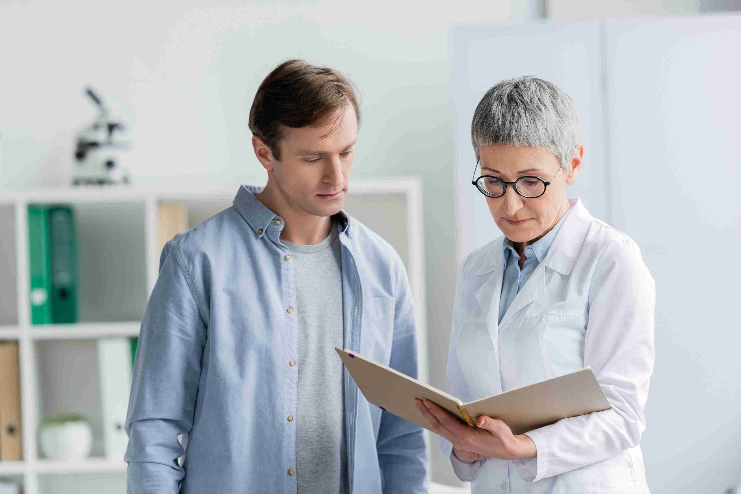 doctor showing a patient test results
