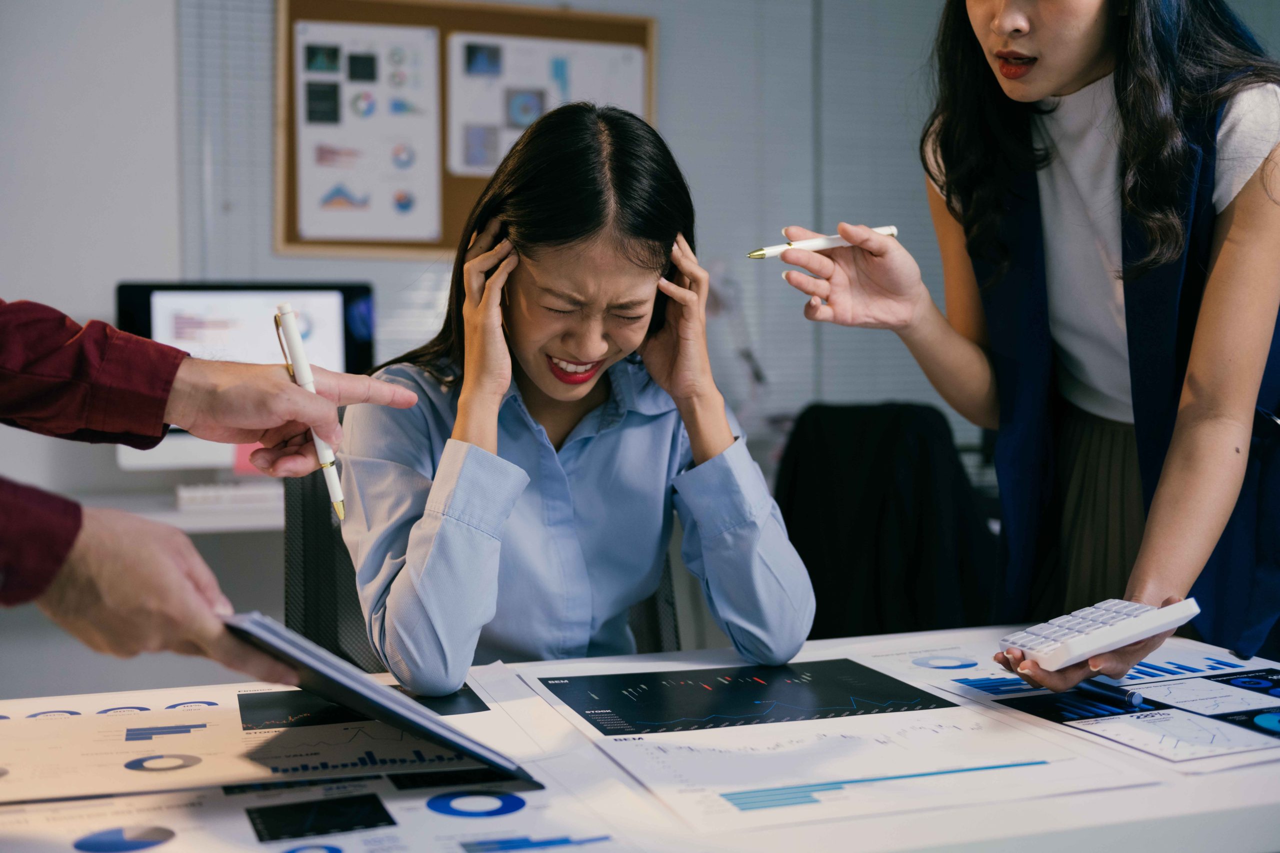 woman looking so stressed at work
