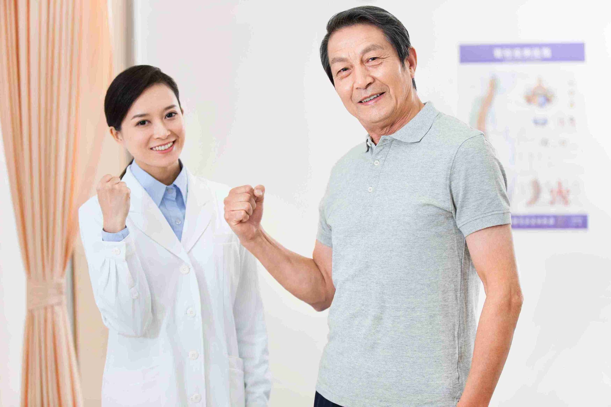 doctor and patient smiling at the camera