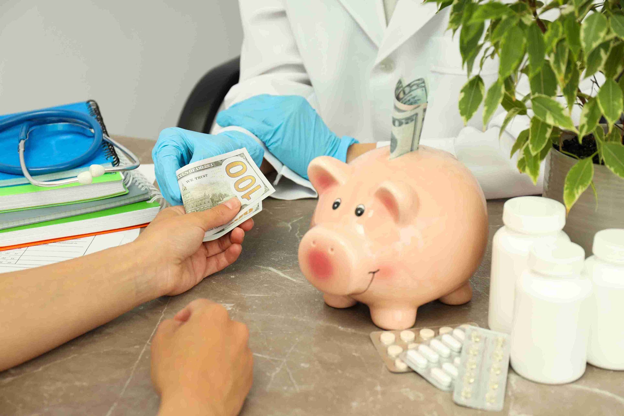 patient giving money to the doctor