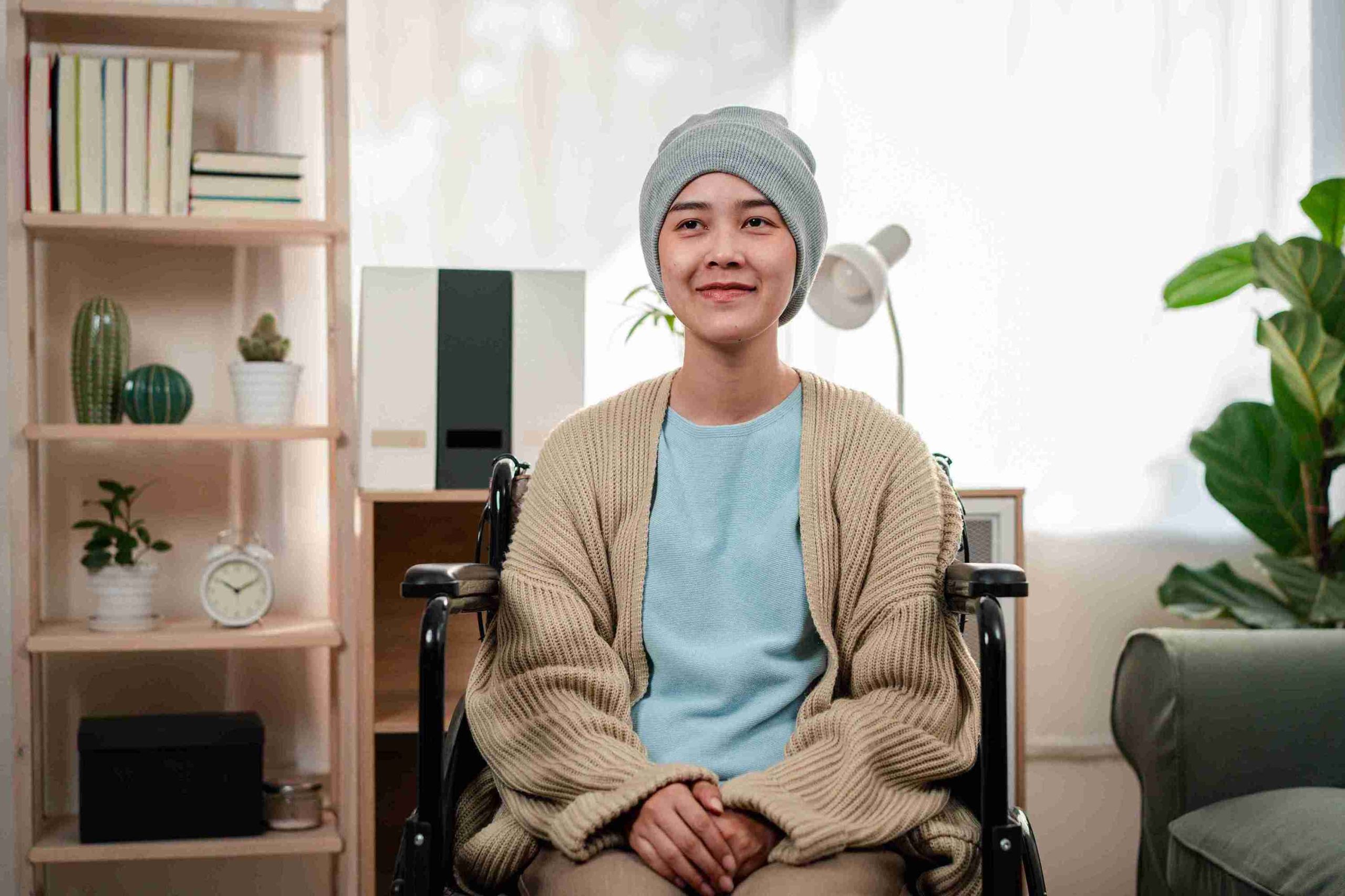 female cancer patient sitting and smiling