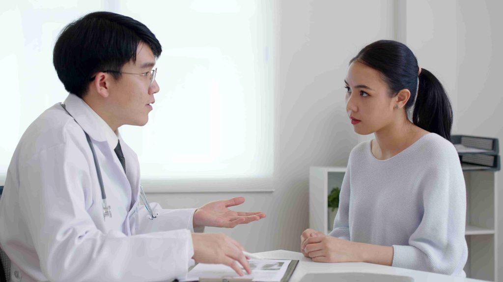 Doctor explaining things to a patient.