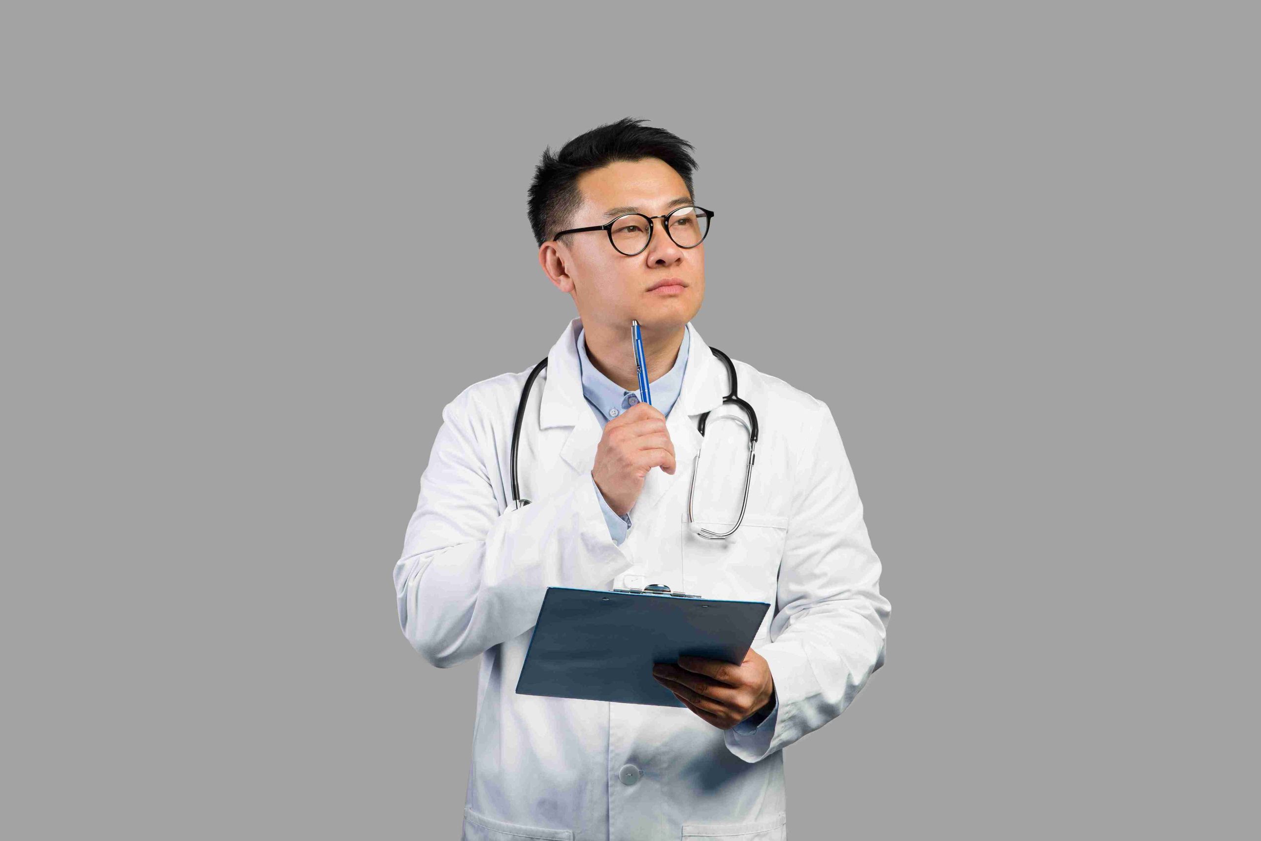 Young doctor analyzing patient results.