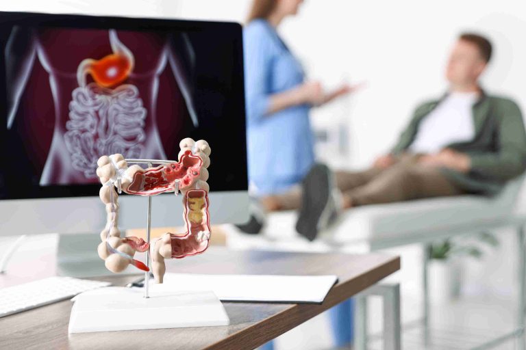 Image of a man speaking with his doctor in a clinic.