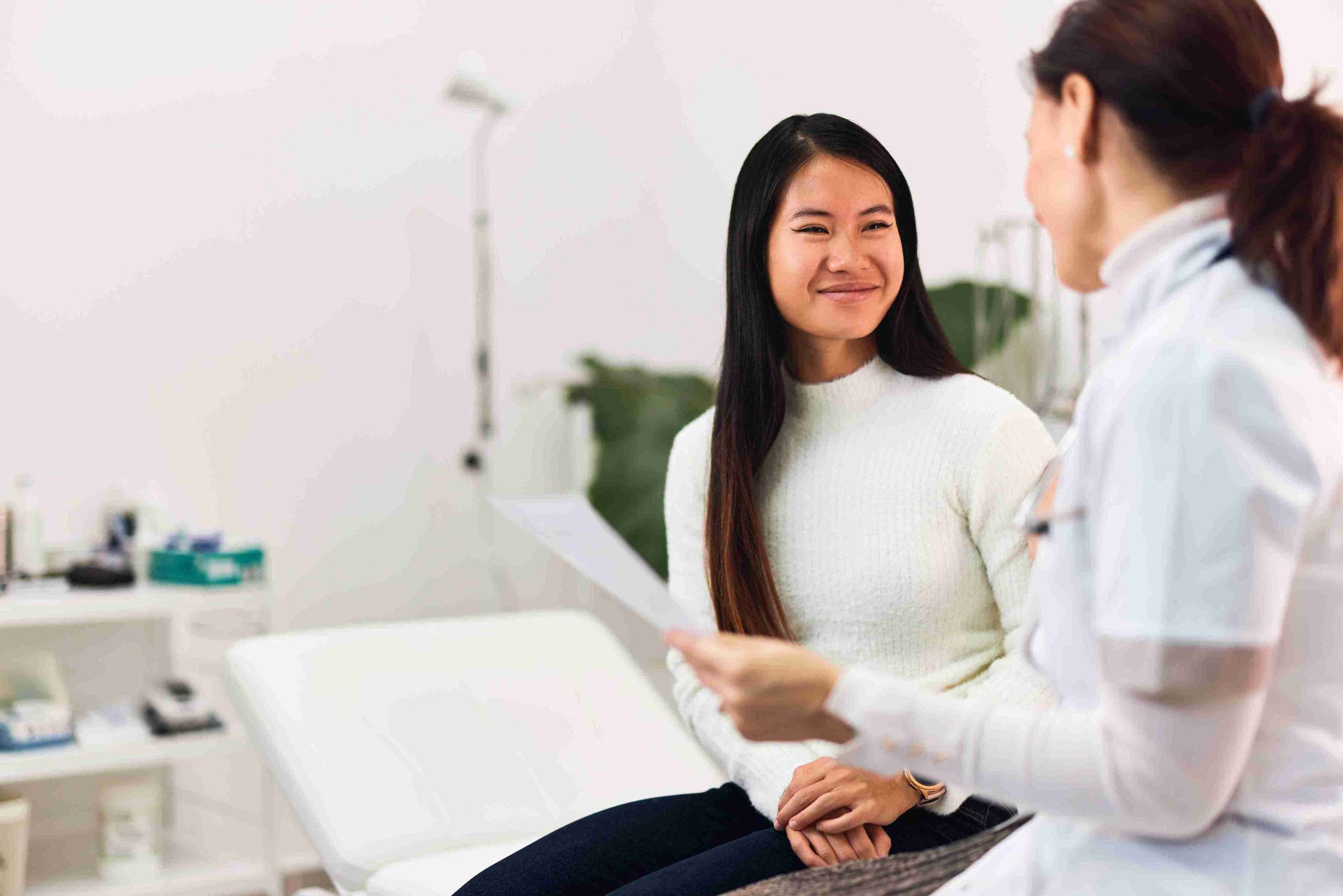 Woman consulting a female doctor.