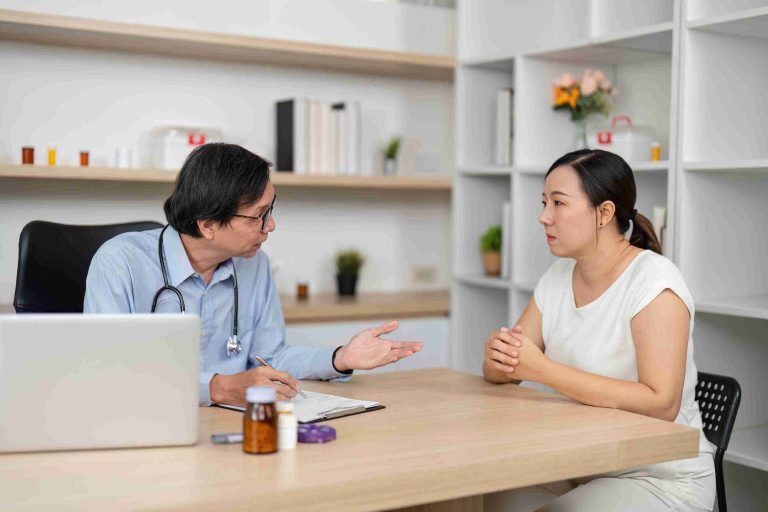 Doctor giving instructions to his patient.